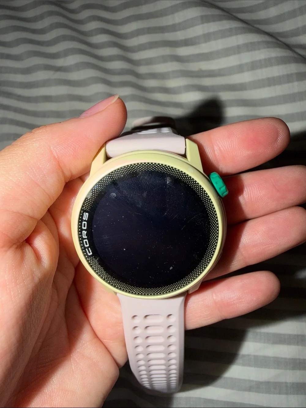 Coros sports watch with pink band